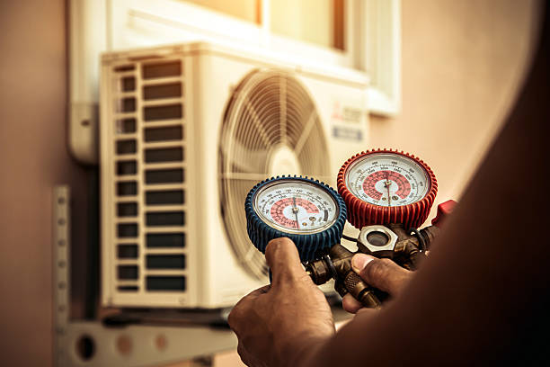 Professional Hvac technician working in Milan, NM
